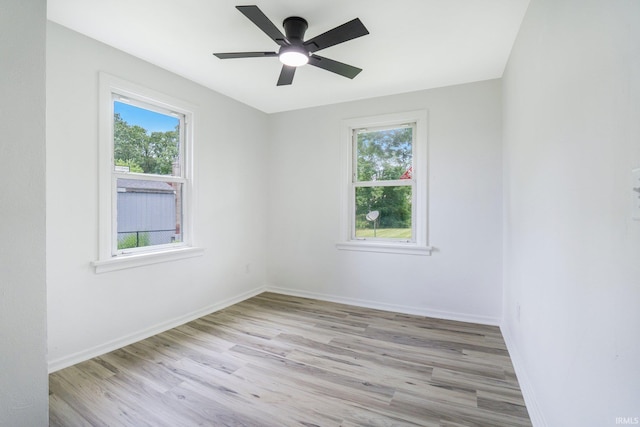 5729 Saint Joe Center Rd, Fort Wayne, IN 46835 - spare room featuring healthy amount of natural light, light wood-style floors, and ceiling fan