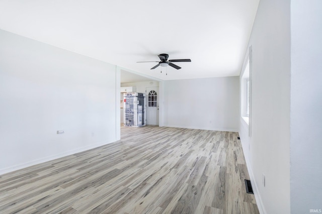 5729 Saint Joe Center Rd, Fort Wayne, IN 46835 - unfurnished living room with light wood-style flooring and ceiling fan