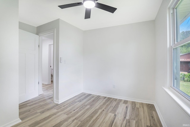 5729 Saint Joe Center Rd, Fort Wayne, IN 46835 - unfurnished room featuring light wood-style flooring, a ceiling fan, and healthy amount of natural light