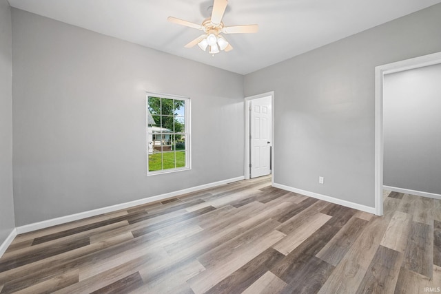 809 E 5th St, Fowler, IN 47944 - empty room featuring a ceiling fan and wood finished floors