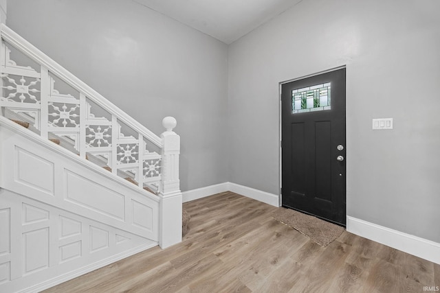 809 E 5th St, Fowler, IN 47944 - foyer featuring stairway and wood finished floors