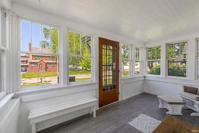 220 N Line St, Churubusco, IN 46723 - unfurnished sunroom with radiator and wood finished floors
