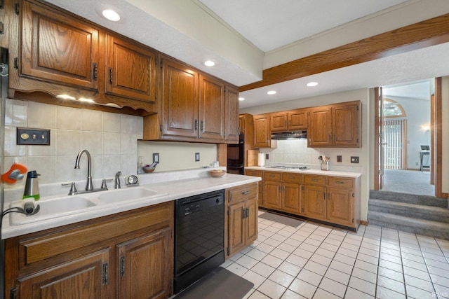 220 N Line St, Churubusco, IN 46723 - kitchen with dishwasher, backsplash, light countertops, brown cabinetry, and recessed lighting