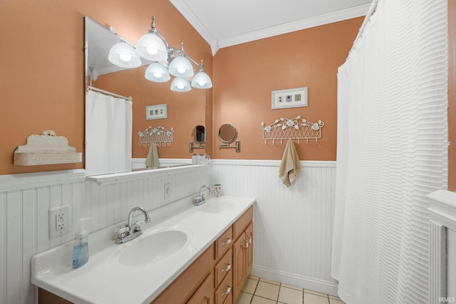220 N Line St, Churubusco, IN 46723 - full bath featuring crown molding, a wainscoted wall, double vanity, and tile patterned flooring