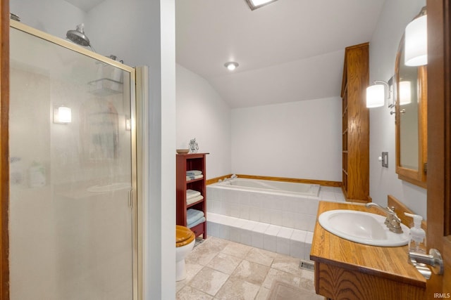 220 N Line St, Churubusco, IN 46723 - full bathroom with a stall shower, lofted ceiling, a garden tub, and vanity
