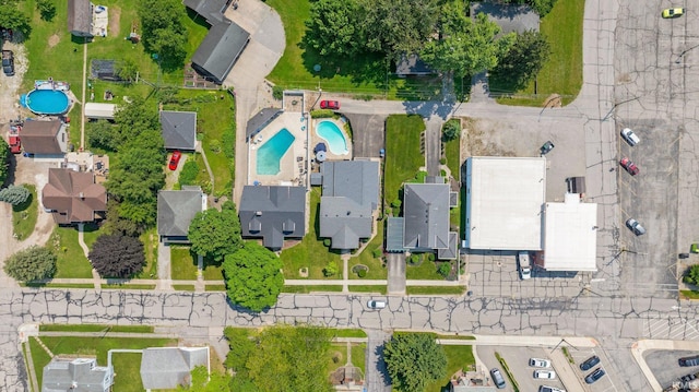 220 N Line St, Churubusco, IN 46723 - aerial overview of property's location with a pool area