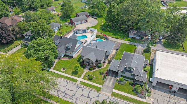 220 N Line St, Churubusco, IN 46723 - aerial view of property and surrounding area featuring nearby suburban area and a pool area