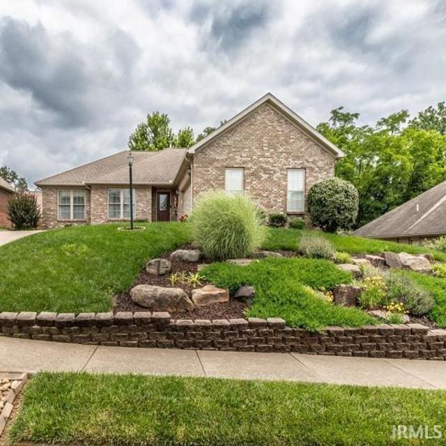 805 Alyssum Dr, Evansville, IN 47712 - single story home featuring brick siding and a front lawn