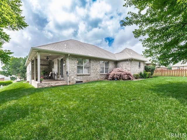 805 Alyssum Dr, Evansville, IN 47712 - back of house with a ceiling fan, a patio area, and brick siding