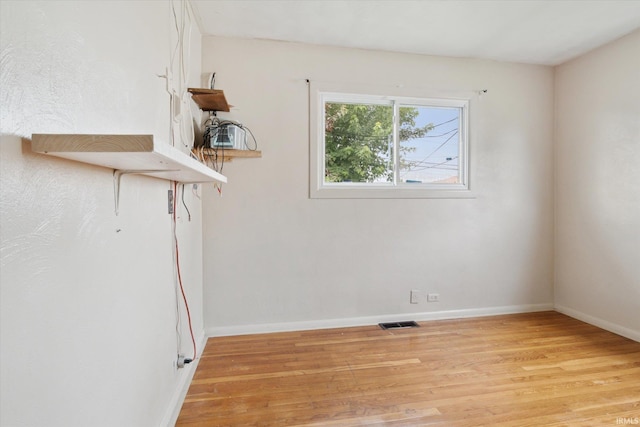 5210 W Washington St, South Bend, IN 46619 - unfurnished room with light wood-style flooring and baseboards