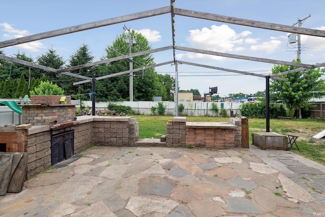 5210 W Washington St, South Bend, IN 46619 - fenced backyard with an outdoor kitchen and a patio