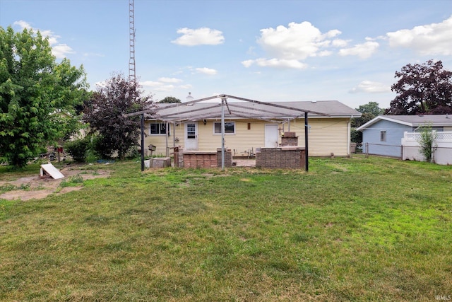 5210 W Washington St, South Bend, IN 46619 - rear view of house featuring a pergola and a patio