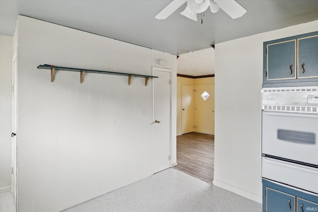 5210 W Washington St, South Bend, IN 46619 - spare room featuring ceiling fan and dark speckled floor
