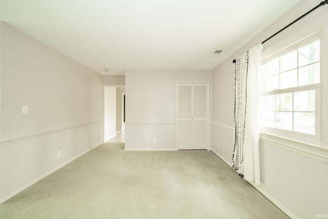 2613 Queensbury Rd, Muncie, IN 47304 - unfurnished room with light colored carpet and baseboards
