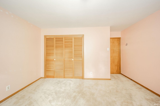 2613 Queensbury Rd, Muncie, IN 47304 - unfurnished bedroom featuring a closet and carpet