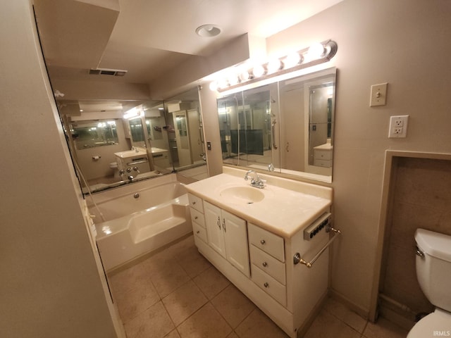 2407 George St, Logansport, IN 46947 - full bath with tile patterned flooring, vanity, and a garden tub