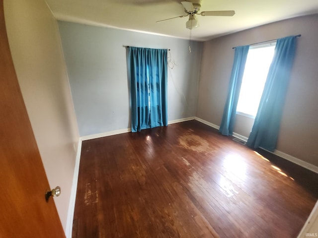 2407 George St, Logansport, IN 46947 - spare room featuring hardwood / wood-style floors and a ceiling fan