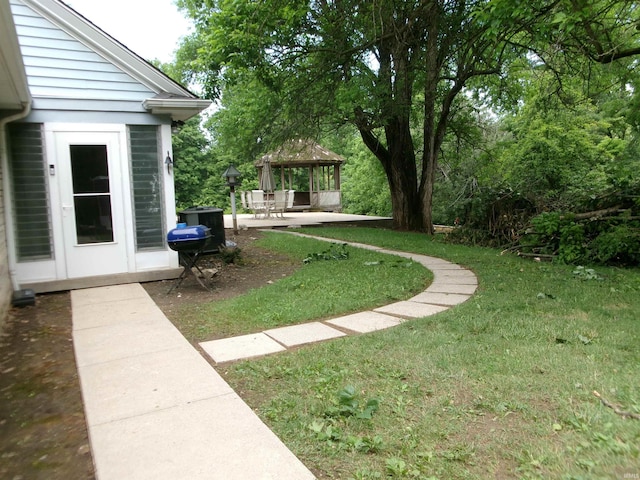 908 N Hawthorne St, Marion, IN 46952 - view of grassy yard with a gazebo and a patio area