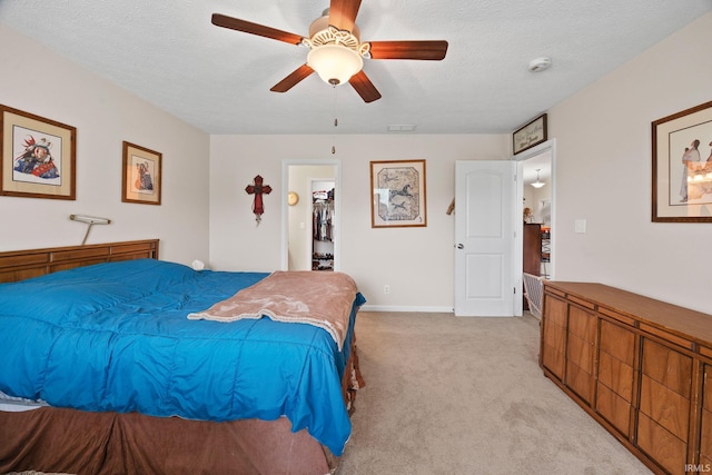 807 Percheron Pl, Lafayette, IN 47905 - bedroom featuring light colored carpet, a spacious closet, a ceiling fan, and a textured ceiling