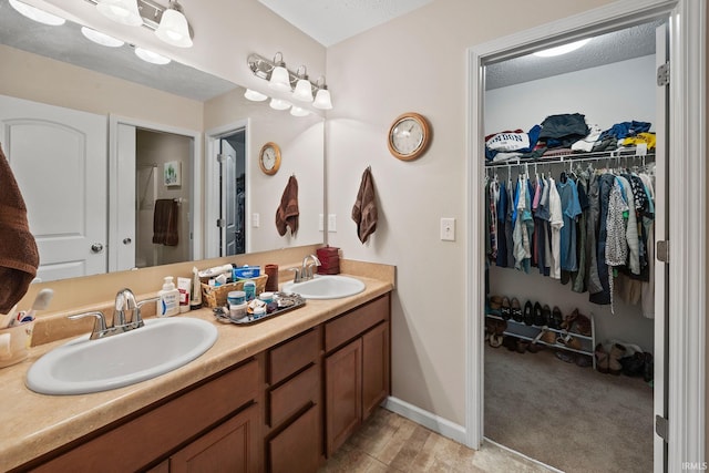 807 Percheron Pl, Lafayette, IN 47905 - bathroom with double vanity and a spacious closet