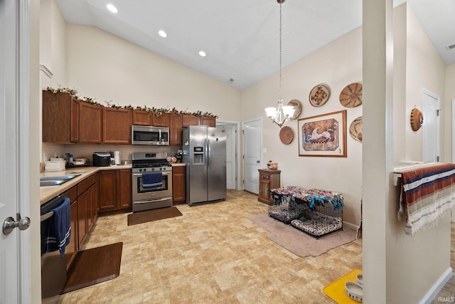 807 Percheron Pl, Lafayette, IN 47905 - kitchen featuring stainless steel appliances, high vaulted ceiling, light countertops, pendant lighting, and brown cabinets