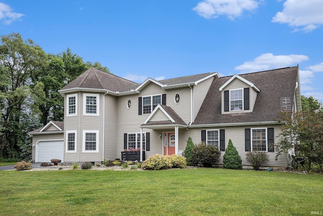 58380 Ash Rd, Osceola, IN 46561 - view of front facade featuring a front lawn, an attached garage, and roof with shingles