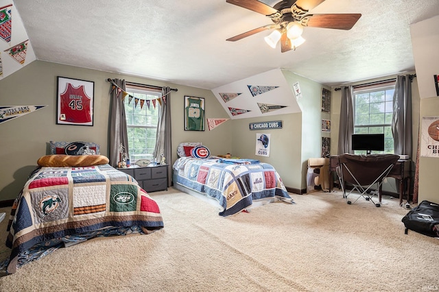 58380 Ash Rd, Osceola, IN 46561 - bedroom featuring carpet flooring, a textured ceiling, a ceiling fan, and vaulted ceiling