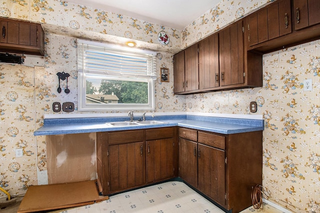 1356 Hampshire Dr, South Bend, IN 46614 - kitchen with wallpapered walls