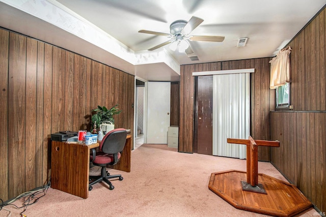 1356 Hampshire Dr, South Bend, IN 46614 - office space with light carpet, a ceiling fan, and wood walls