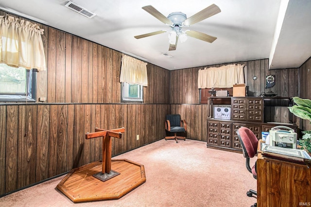 1356 Hampshire Dr, South Bend, IN 46614 - carpeted home office with wooden walls and ceiling fan