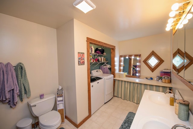 403 E Columbia St, Flora, IN 46929 - full bath with washing machine and clothes dryer and double vanity