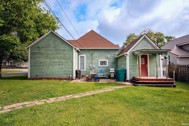 403 E Columbia St, Flora, IN 46929 - rear view of house with a patio