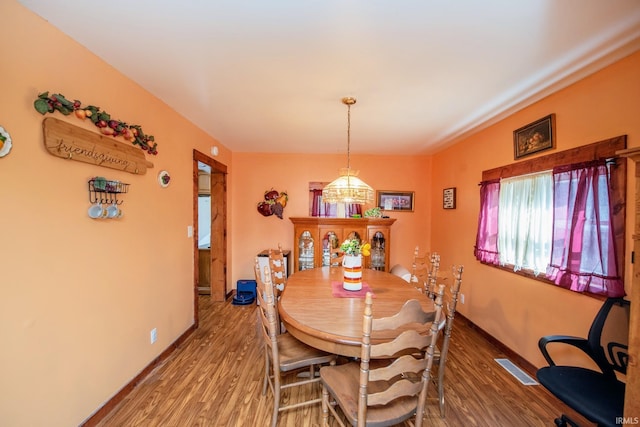 403 E Columbia St, Flora, IN 46929 - dining space with wood finished floors
