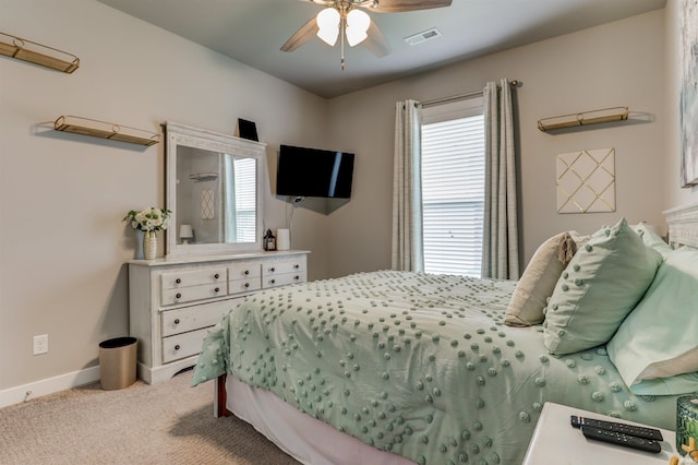 5573 Camden Dr, Newburgh, IN 47630 - bedroom with light carpet and a ceiling fan