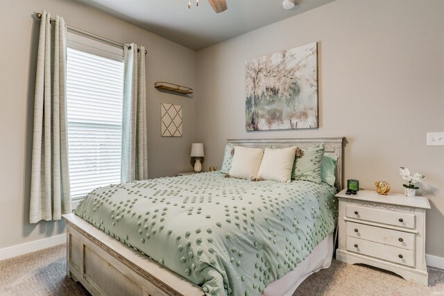 5573 Camden Dr, Newburgh, IN 47630 - bedroom with light colored carpet, multiple windows, and a ceiling fan