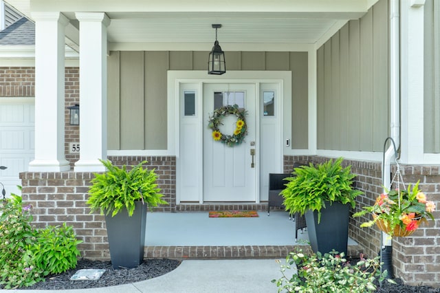 5573 Camden Dr, Newburgh, IN 47630 - entrance to property with a porch, board and batten siding, and brick siding