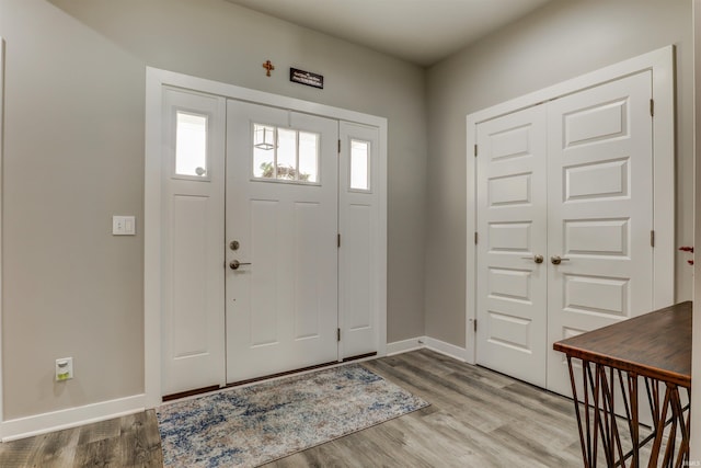 5573 Camden Dr, Newburgh, IN 47630 - foyer with baseboards and wood finished floors