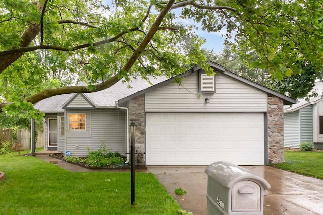5209 Jenny Ln, Mishawaka, IN 46545 - single story home featuring stone siding, concrete driveway, a garage, and a shingled roof