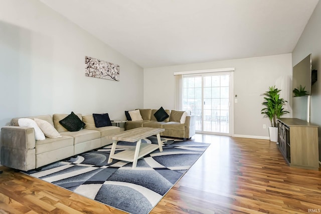 5209 Jenny Ln, Mishawaka, IN 46545 - living room with vaulted ceiling and wood finished floors