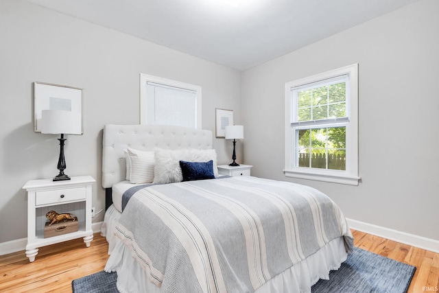 415 Wakewa Ave, South Bend, IN 46617 - bedroom featuring wood finished floors and baseboards