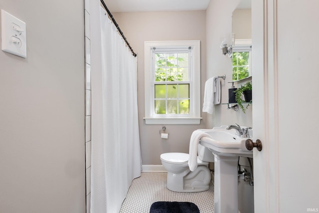 415 Wakewa Ave, South Bend, IN 46617 - full bathroom with tile patterned flooring and curtained shower