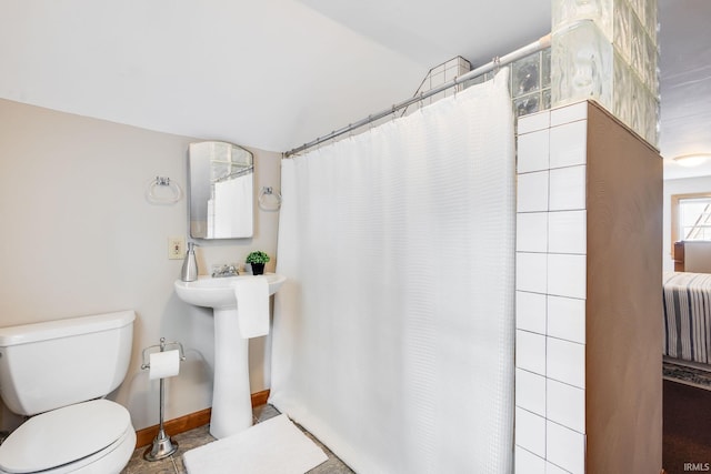 415 Wakewa Ave, South Bend, IN 46617 - bathroom with lofted ceiling and a shower with shower curtain
