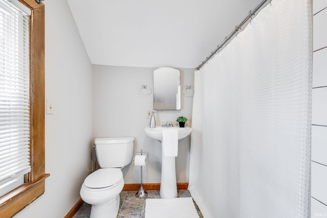 415 Wakewa Ave, South Bend, IN 46617 - full bathroom with baseboards and a shower with curtain