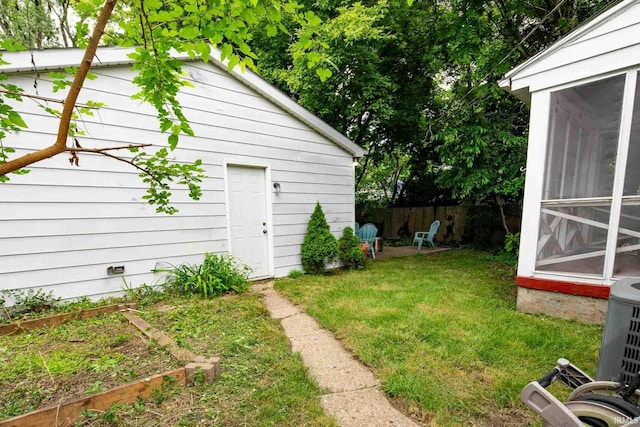 415 Wakewa Ave, South Bend, IN 46617 - view of yard with a sunroom