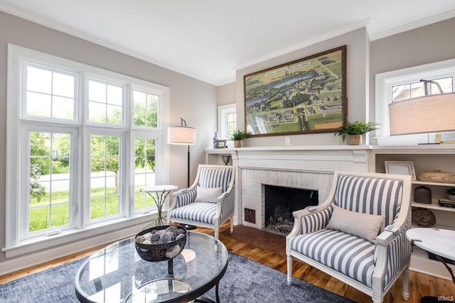 415 Wakewa Ave, South Bend, IN 46617 - living area featuring ornamental molding, wood finished floors, and a fireplace