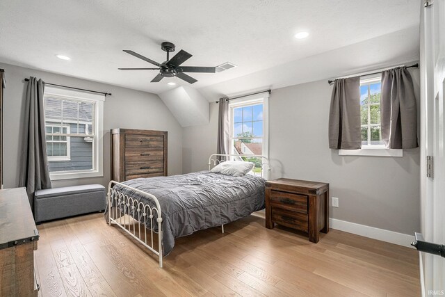 1414 Longfellow Ave, South Bend, IN 46615 - bedroom featuring light wood-style flooring, recessed lighting, ceiling fan, and vaulted ceiling