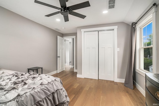 1414 Longfellow Ave, South Bend, IN 46615 - bedroom with light wood finished floors, recessed lighting, a closet, a ceiling fan, and vaulted ceiling
