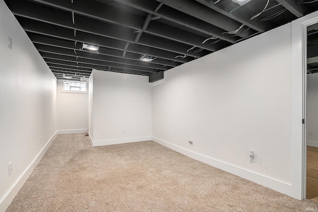 1414 Longfellow Ave, South Bend, IN 46615 - below grade area with carpet flooring and baseboards
