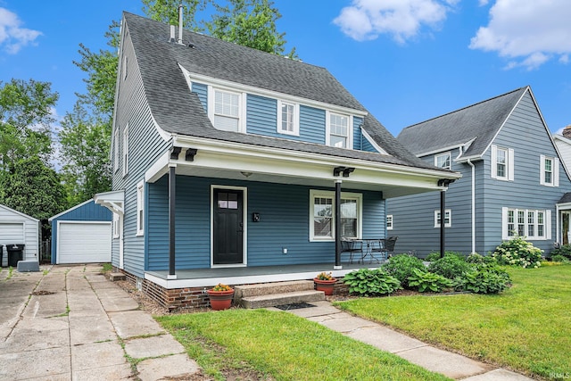 1414 Longfellow Ave, South Bend, IN 46615 - view of front of property featuring a porch, an outbuilding, a front lawn, a detached garage, and roof with shingles