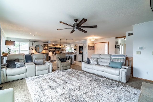280 Ln 230 Jimmerson Lk, Angola, IN 46703 - living room featuring light colored carpet and a ceiling fan